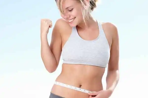 woman happy after fat reduction treatment Liverpool