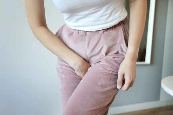 woman struggling with urine incontinence Liverpool