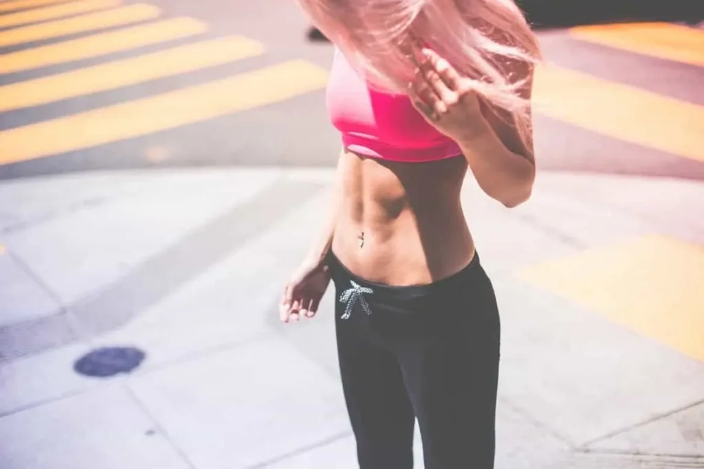 Woman with toned stomach after LA-EMS Body Sculpting Treatment Liverpool